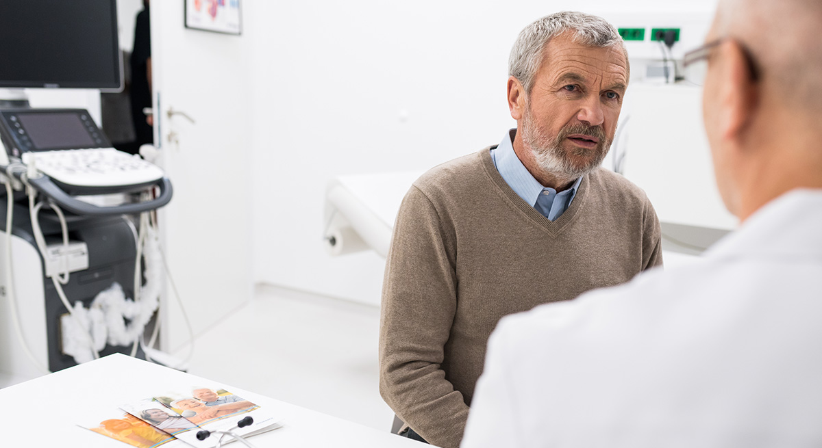 Male patient talking to male doctor_reduced_blog post