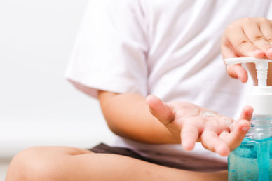 Young-child-with-hand-sanitizer